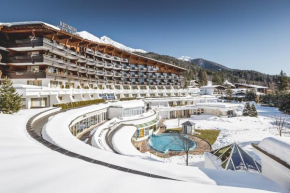 Отель Krumers Alpin Resort & Spa, Зеефельд